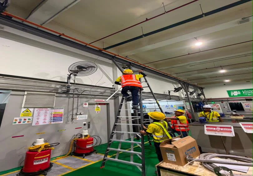 Industrial installation work — TAS team photograph