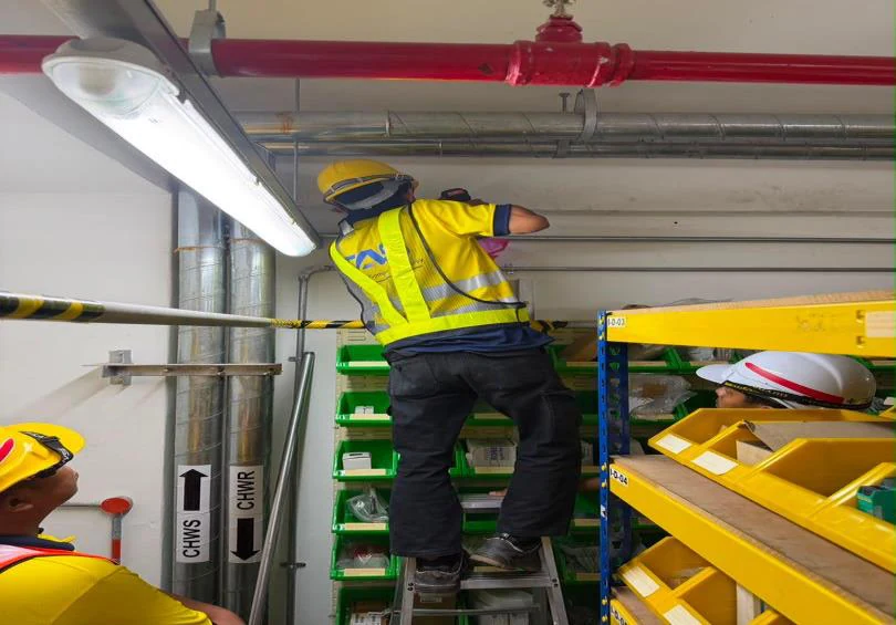 Installation with access equipment — TAS team photograph